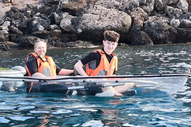 transparent-electric-kayaks-with-guide