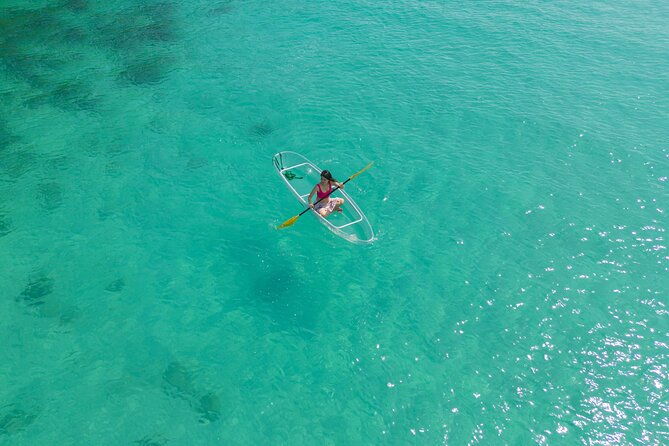 transparent-kayaking-or-sup-ing-around-islands