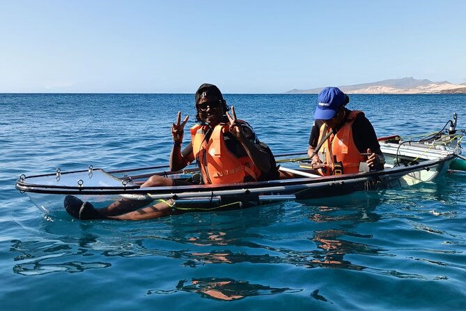 transparent-electric-kayaks-with-guide