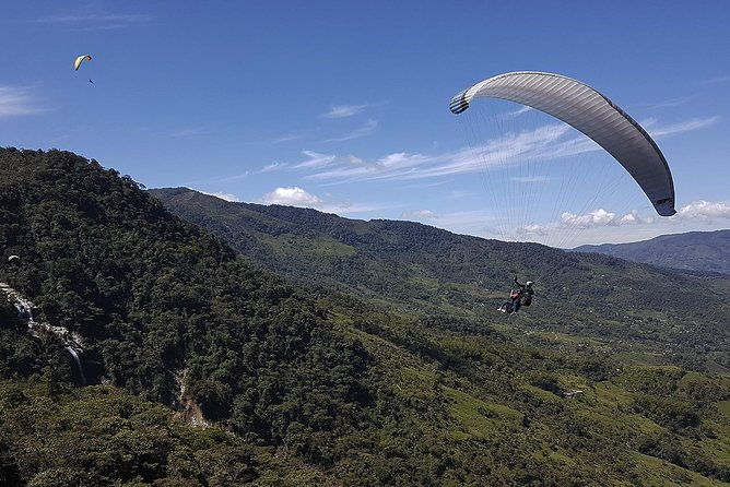 fun-rafting-awesome-paragliding-over-giant-waterfalls-from-medellin