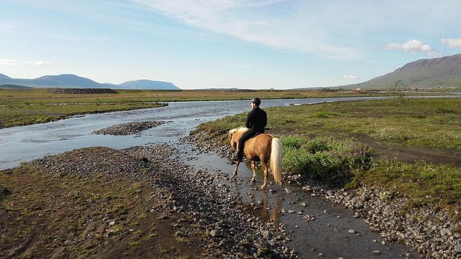 horse-riding-tour-to-the-glacier-river-delta-with-waterfall