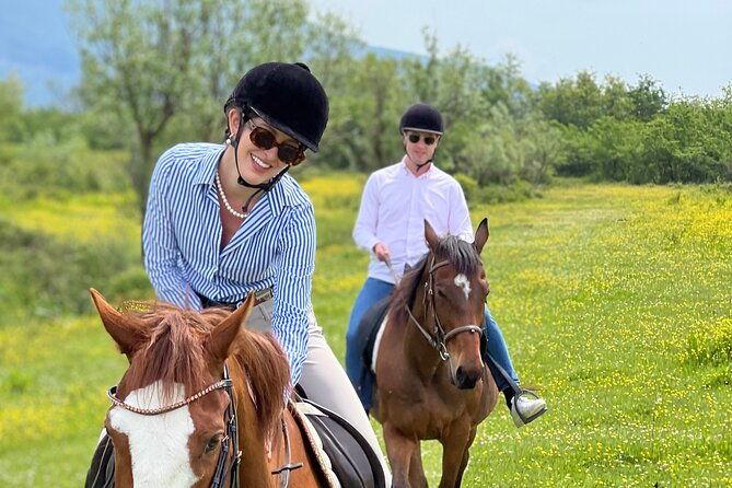 horseback-riding-across-river-ljuta-with-transport