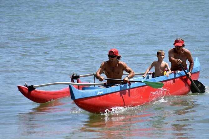 outrigger-canoe-surfing-at-kalapaki-beach