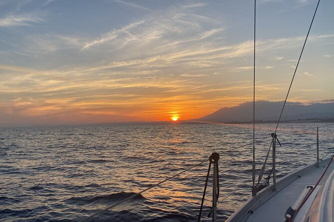 sunset-sailing-along-the-cliffs-of-maro-private