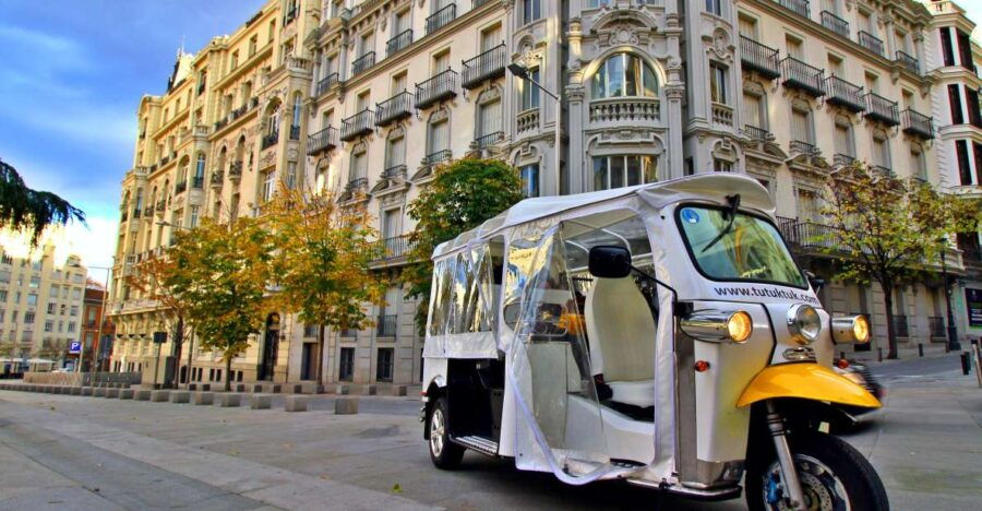 madrid-traditional-tour-wh-private-guide-in-yellow-tuk-tuk