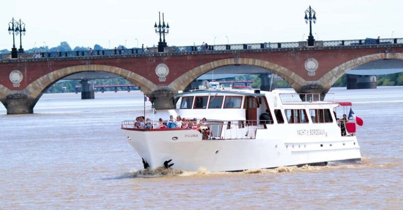 bordeaux-river-garonne-cruise-with-glass-of-wine-and-canele