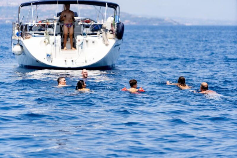 catania-cyclops-coast-sailboat-tour-with-snorkel-prosecco