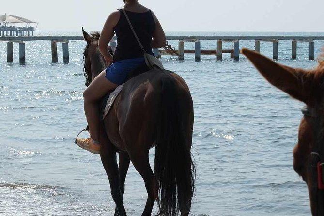 horse-riding-on-the-beach-in-side