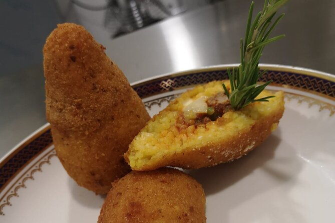 course-of-arancini-and-almond-paste-in-catania