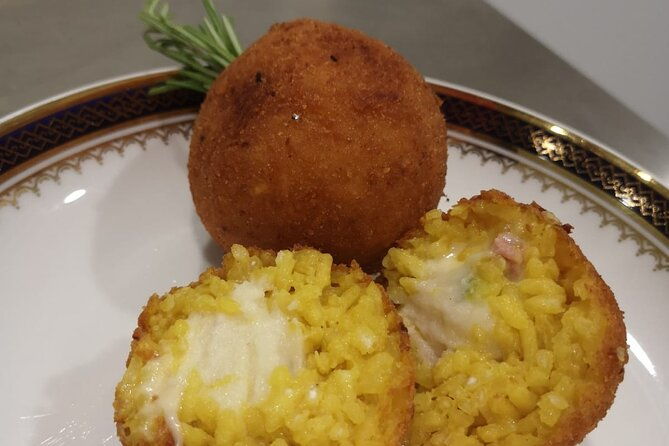 course-of-arancini-and-almond-paste-in-catania