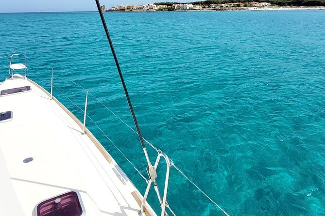 private-catamaran-sailing-trip-around-la-caletta-berchida-sardinia