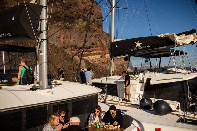 santorini-sailing-sunset-catamaran-cruise-w-greek-bbq-thirasia