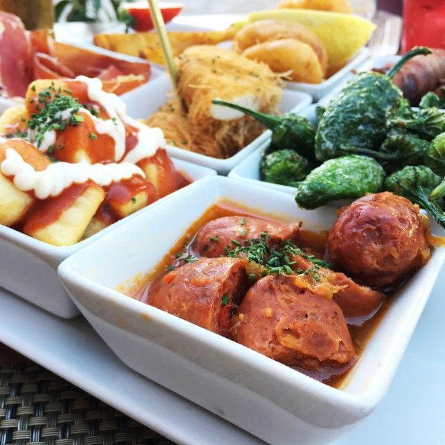 3-hour-tapas-tour-in-triana-sevillas-vibrant-neighborhood