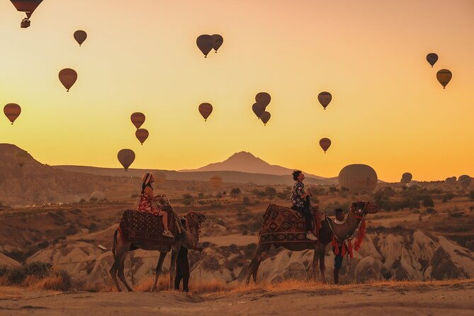camel-ride-through-cappadocias-fairy-chimneys-with-balloon-view