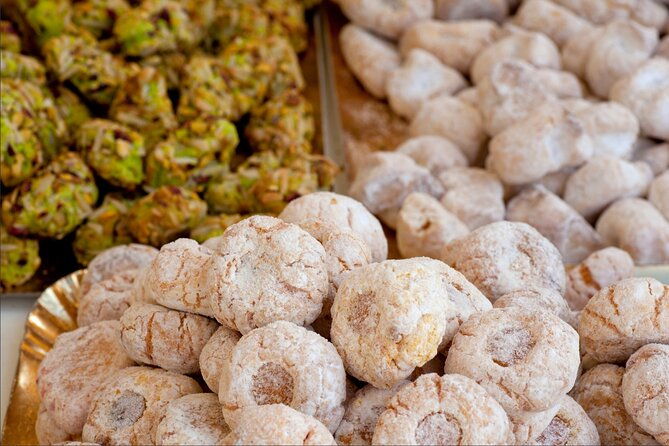 course-of-arancini-and-almond-paste-in-catania