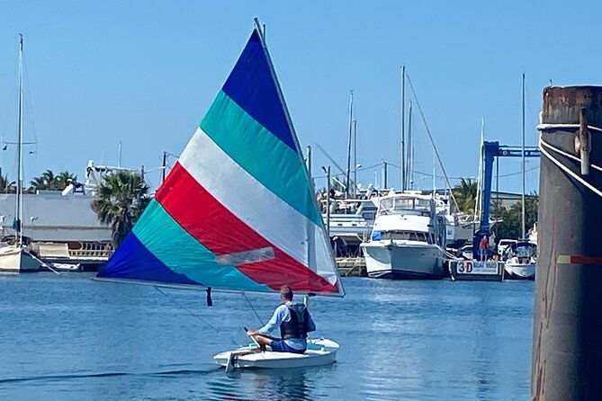 dock-side-adventure-kayak-paddle-boarding-sunfish-sailboats