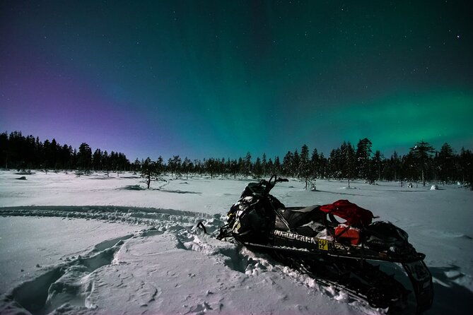 evening-snowmobile-safari-with-campfire-in-saariselka