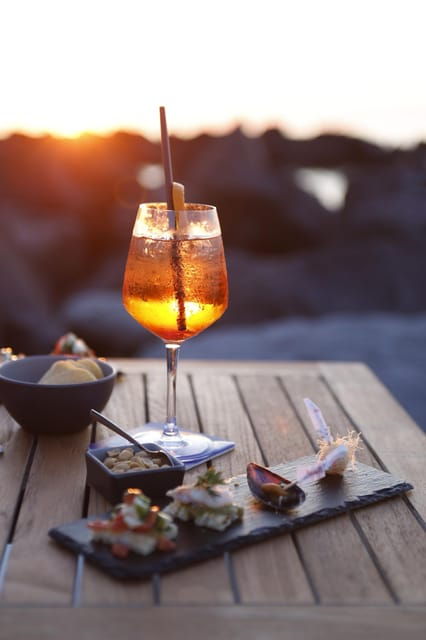 italian-aperitif-at-the-sunset-by-the-sea