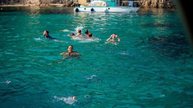 from-lefkimmi-blue-lagoon-and-syvota-village-cruise