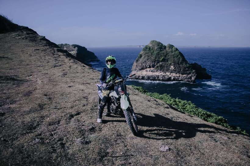 lombok-dirt-bike-through-cliffs-beaches-hill-with-sunset