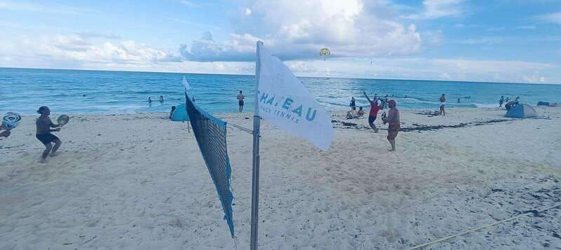cancun-beach-tennis-game-day-with-local-community