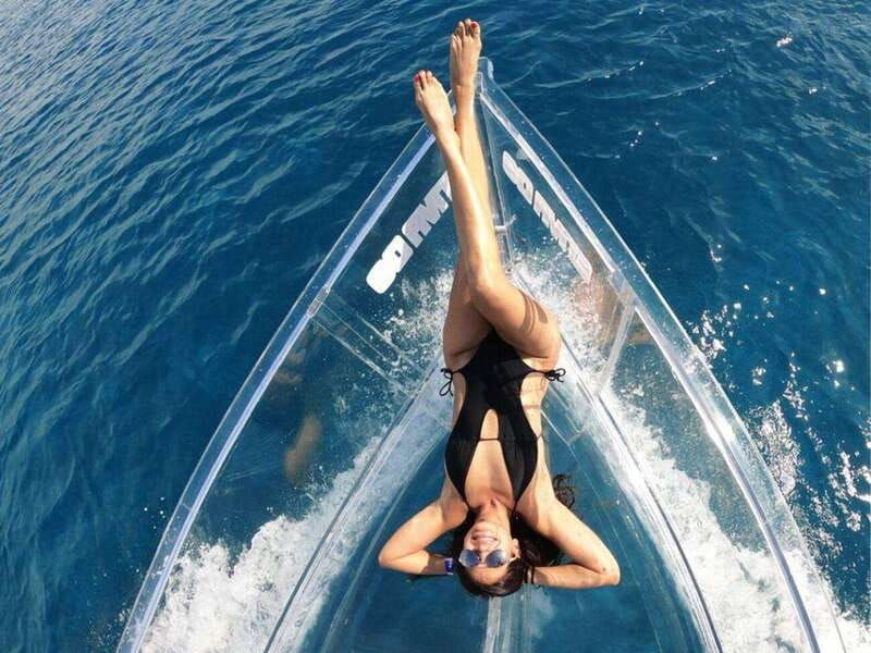 snorkeling-in-cozumel-waters-in-a-transparent-boat-beers