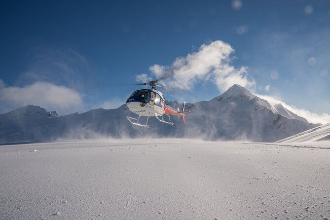 The Grand Circle 30-Minute Helicopter Flight from Queenstown - The Landing and Experience on the Mountain