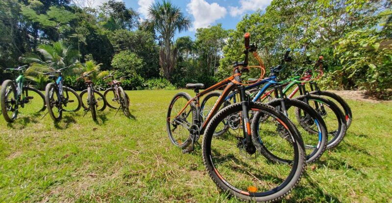 biking-in-peruvian-rainforest-with-lagoon-visit