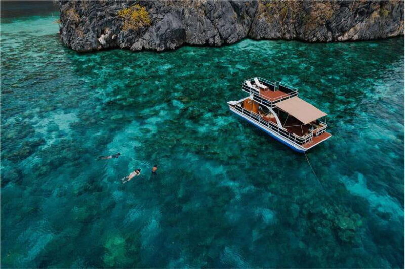 coron-island-hopping-private-double-deck-party-boat-slide