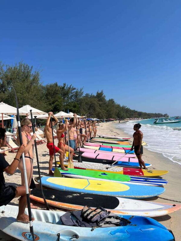 gili-sunrise-stand-up-paddle-boarding-or-kayaking-droneshot