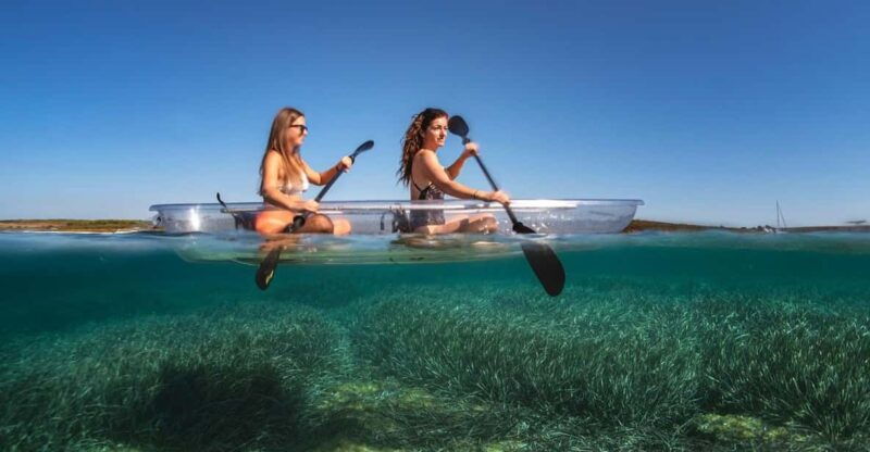 pula-clear-kayak-tour-to-canyon-island-cliffs-small-cave