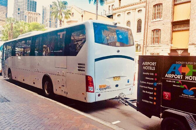 Sydney Airport to Sydney CBD shared ride seat in vehicle shuttle transfer - The Sum Up