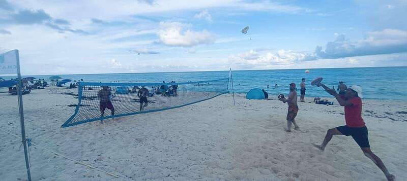 cancun-beach-tennis-game-day-with-local-community