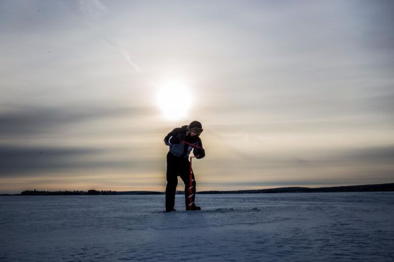 levi-ice-fishing-on-a-frozen-lake