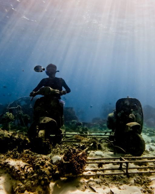 private-snorkeling-with-turtle-and-romantice-statue
