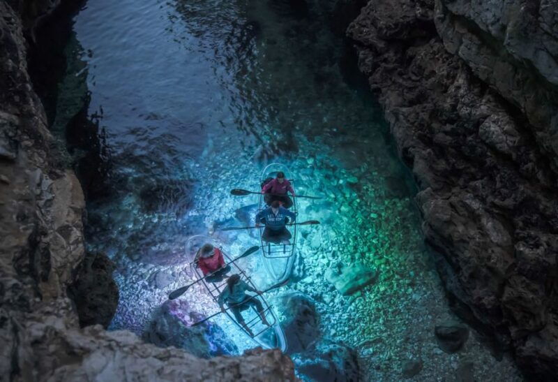 pula-night-time-sea-kayaking-tour-in-transparent-kayak