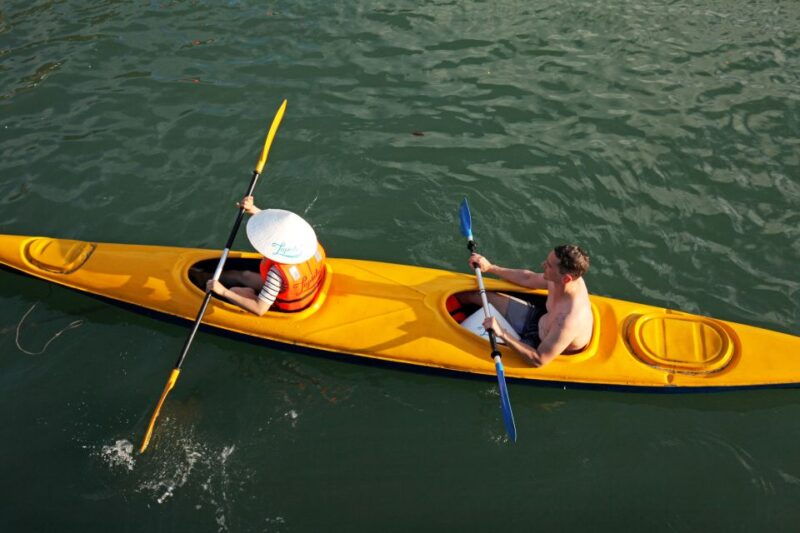 ha-long-surprise-cave-full-day-cruise-with-kayak-and-beach