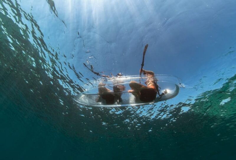 pula-clear-kayak-tour-to-canyon-island-cliffs-small-cave