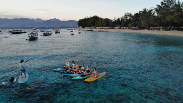 gili-sunrise-stand-up-paddle-boarding-or-kayaking-droneshot
