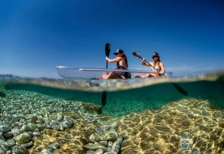 pula-clear-kayak-tour-to-canyon-island-cliffs-small-cave