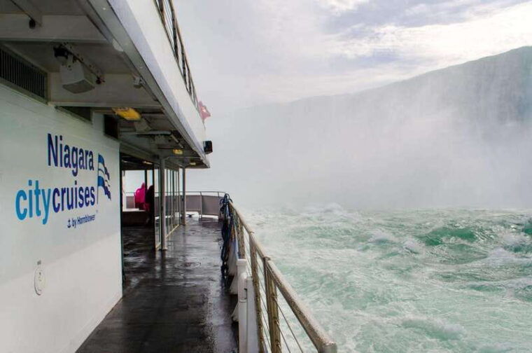 niagara-falls-tour-from-toronto-with-boat-behind-the-falls