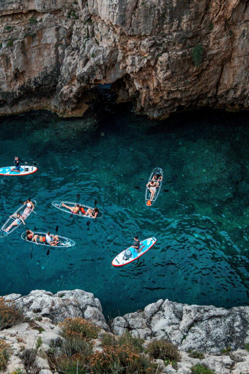 pula-sunset-night-illuminated-transparent-kayak-tour