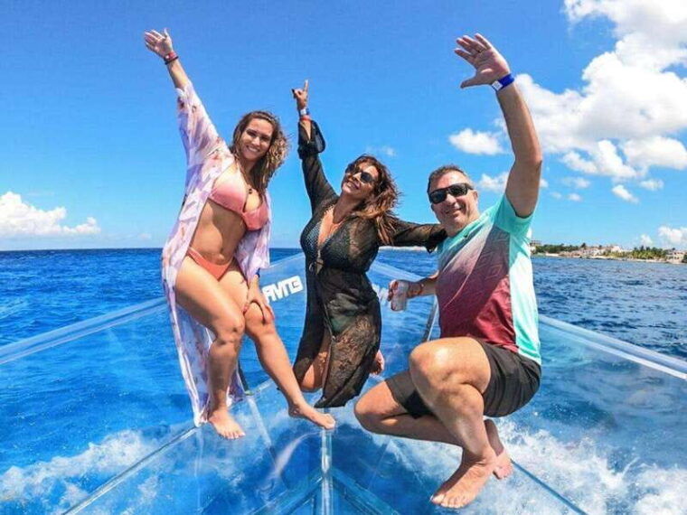 snorkeling-in-cozumel-waters-in-a-transparent-boat-beers