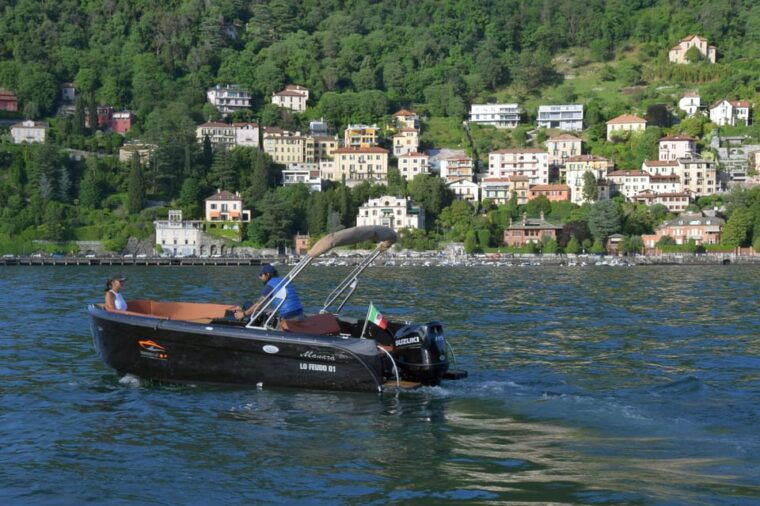 lake-como-boat-ride-with-an-elegant-black-boat