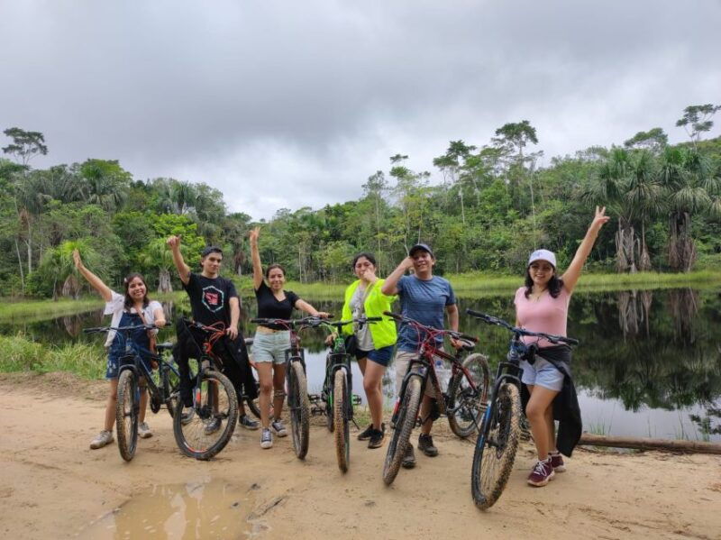 biking-in-peruvian-rainforest-with-lagoon-visit