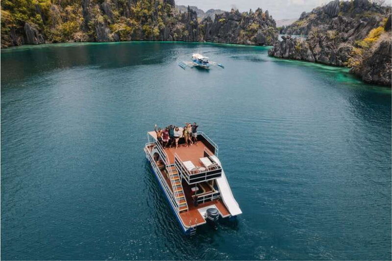 coron-island-hopping-private-double-deck-party-boat-slide