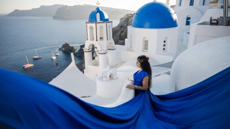 flying-dress-photography-in-oia-santorini