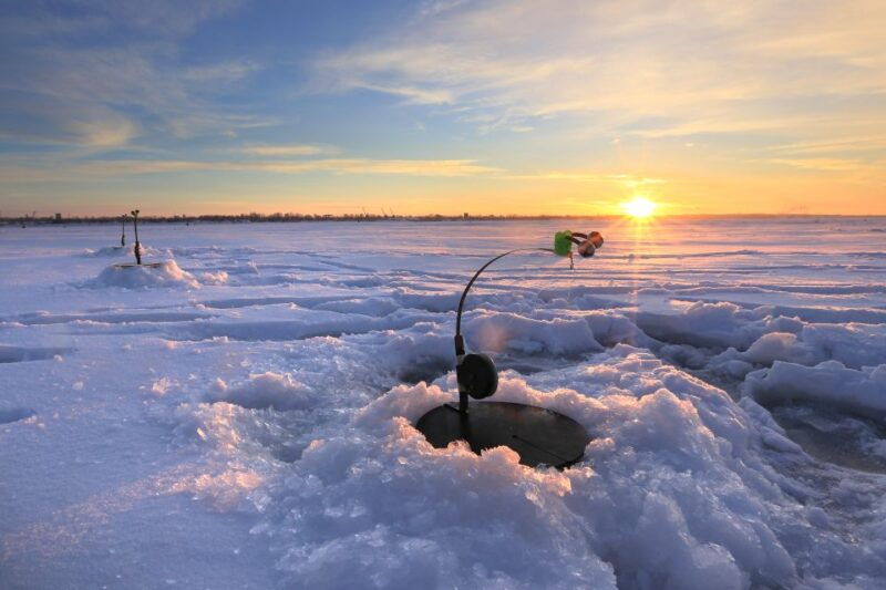 levi-ice-fishing-by-snowmobile