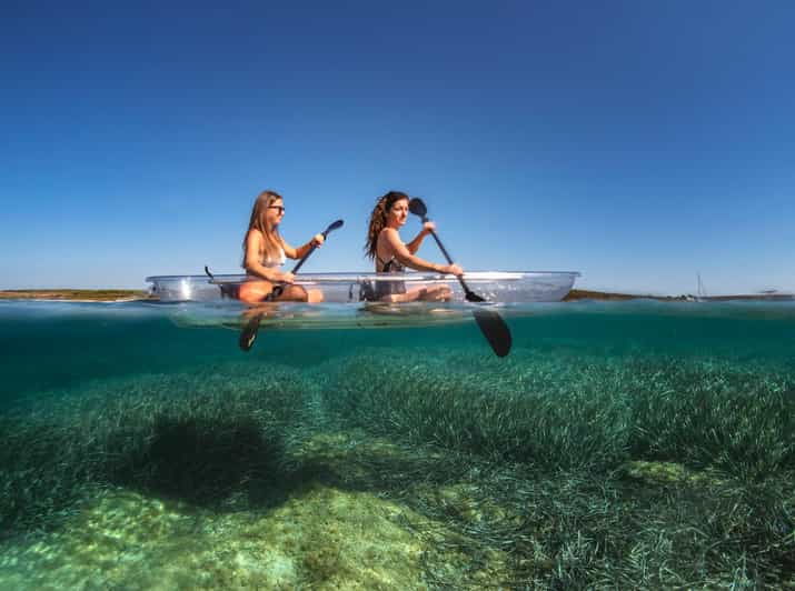 pula-clear-kayak-tour-to-canyon-island-cliffs-small-cave