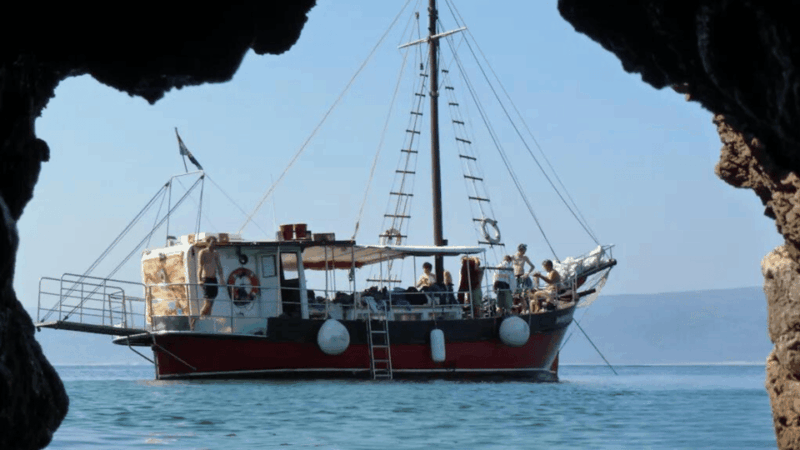 wild-bays-of-krk-sunset-swimming-with-a-pirate-ship